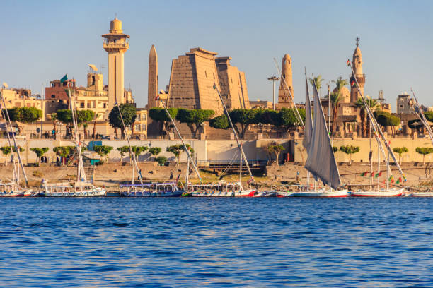 Luxor Temple is a large Ancient Egyptian temple complex on east bank of Nile river in Luxor (ancient Thebes). View from Nile river